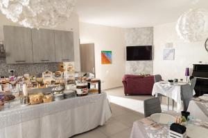 a kitchen with a counter with food on it at Terrazze Dannunziane in Pescara