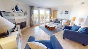 Posezení v ubytování Fort Screven Villas 102 by Tybee Vacation Rentals