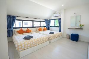 Ένα ή περισσότερα κρεβάτια σε δωμάτιο στο Viewlay Villa Cha am +60 φωτογραφίες