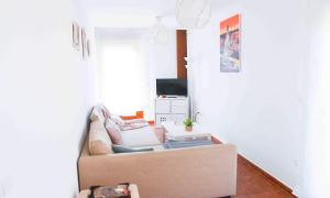 TV a/nebo společenská místnost v ubytování El apartamento de Santa Eva