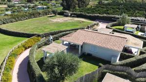 an aerial view of a house with a garden at Ville d'Ogliastra 2 - Marina Suites in Cardedu +192 photos