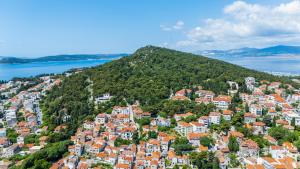 an aerial view of a town on a hill next to the water at Villa Varoš in Split