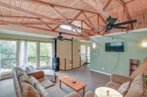 a living room with couches and a flat screen tv at Kasa Casa at High Hope Ranch 3bed Cowboy Pool in Glen Rose