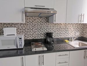 Kuchyň nebo kuchyňský kout v ubytování Apt 1bdr 1bth