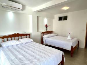 Katil atau katil-katil dalam bilik di Casa Blanca Manuel Antonio A1, Central, Pool, Gated