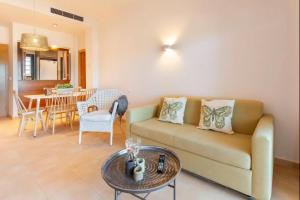 Posezení v ubytování Casita Palmera- Malasia 44 Precioso y Tranquilo Apartamento en Hacienda del Alamo