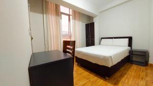 Postel nebo postele na pokoji v ubytování Samaná Hostal + 24 fotografií