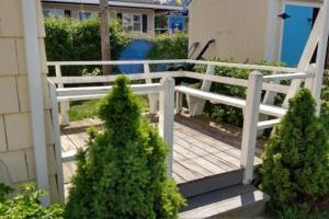 Сад в Little Miss Cottages - Two Bedroom Cottage - 10 +1 фотография