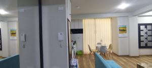 Χώρος καθιστικού στο Renato's Hospedaje