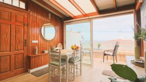 Posezení v ubytování Bungalow Los Tulipanes