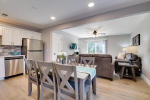 a kitchen and living room with a table and chairs at Kimberling City Getaway Fish and Boat Nearby! in Kimberling City