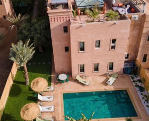 an aerial view of a building with a swimming pool at Villa Dar Soka in Marrakesh