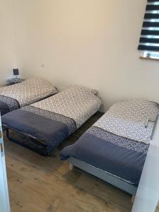 Postel nebo postele na pokoji v ubytování La Grande Escale des Brias