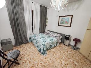 Postel nebo postele na pokoji v ubytování In the Heart of Rome