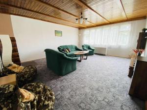 Et opholdsområde på Harrachovský apartmán