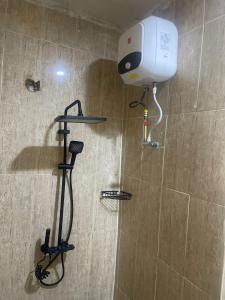 イケジャにあるMercy's Apartmentのバスルーム(シャワー、ヘアドライヤー付)