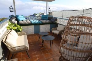 Posezení v ubytování Casa con jardín y jacuzzi + 24 fotografií