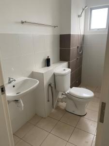 Koupelna v ubytování Homestay TigaCahaya