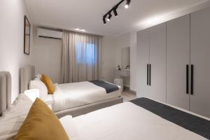 Ένα ή περισσότερα κρεβάτια σε δωμάτιο στο Cairo Homes Down Town El batal