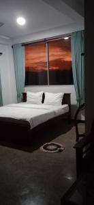 Postel nebo postele na pokoji v ubytování Sanctuaria Luxury Eco Resort