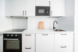 Η κουζίνα ή μικρή κουζίνα στο Beautiful apartment in Fuengirola +6 φωτογραφίες