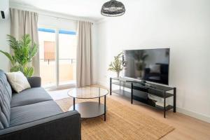 Μια τηλεόραση ή/και κέντρο ψυχαγωγίας στο Beautiful apartment in Fuengirola