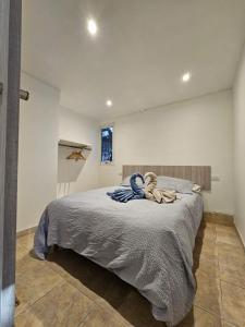 Postel nebo postele na pokoji v ubytování La Casita de Sol