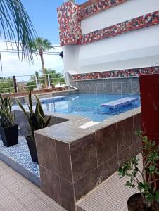 Bazén v ubytování Hotel Mágico del Mar nebo v jeho okolí