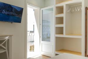 Et tv og/eller underholdning på Emma's Downtown - Eco Design Rooms