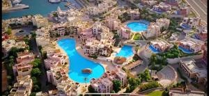 an aerial view of a resort in a resort at One bed room at Talabay Aqaba in Aqaba