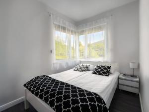 Postel nebo postele na pokoji v ubytování LOTOS