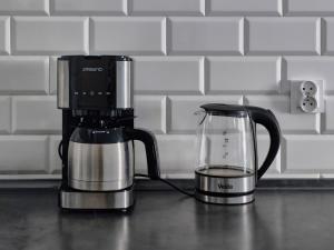 Příslušenství pro přípravu čaje a kávy v ubytování LOTOS + 23 fotografií