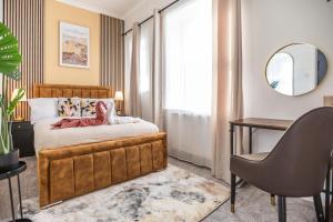 Postel nebo postele na pokoji v ubytování Stylish Greater Manchester home