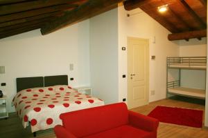 Postel nebo postele na pokoji v ubytování Agriturismo Nicobresaola