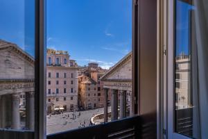a view of a city from a window at AGH Pantheon in Rome