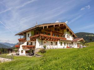 a house on the side of a hill at Landhaus Marchfeld Top 5 in Wildschönau