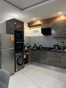 Η κουζίνα ή μικρή κουζίνα στο ProSpec Modern Homes