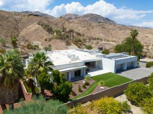 an aerial view of a house with mountains in the background at The Desert Wellness Compound in Palm Desert