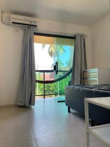 Giường trong phòng chung tại Porto de galinhas - Maracaipe, piscina, mar a 70m