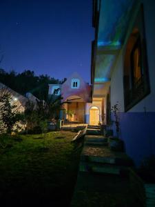 a house at night with the lights on at Lodge Alhambra in Tangier