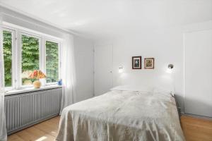 En eller flere senge i et værelse på 4789-Ronne-Stampen-Vej-2-Hus-22