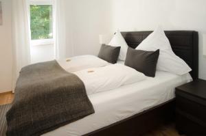 Postel nebo postele na pokoji v ubytování Apart Hotel Paradies