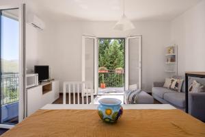 Ένα ή περισσότερα κρεβάτια σε δωμάτιο στο Luce mediterranea a Monreale