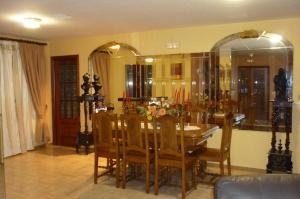 a dining room with a table and some chairs at Hotel Francisco Javier in A Coruña