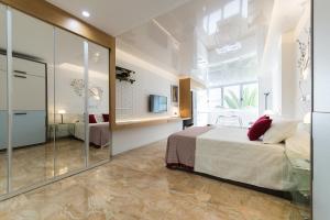 Postel nebo postele na pokoji v ubytování Suites Garden Loft Munch