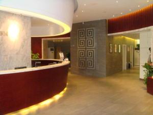 a lobby of a hotel with a reception desk at Jinjiang Inn Shanghai Songjiang University Town in Chengxi