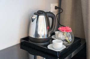 Kafijas/tējas pagatavošanas iespēja naktsmītnē Residence Ten Suite