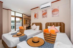 Postel nebo postele na pokoji v ubytování The Outdoor Kata Hotel + 112 fotografií