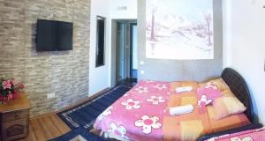 Postel nebo postele na pokoji v ubytování Villa Jadran Apartments