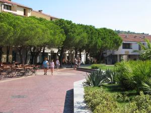 a group of people walking down a sidewalk at Apartment Alea in Portorož
